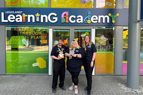 LEGOLAND's education team outside the resort's Learning Academy with their Best Education Workshops Award